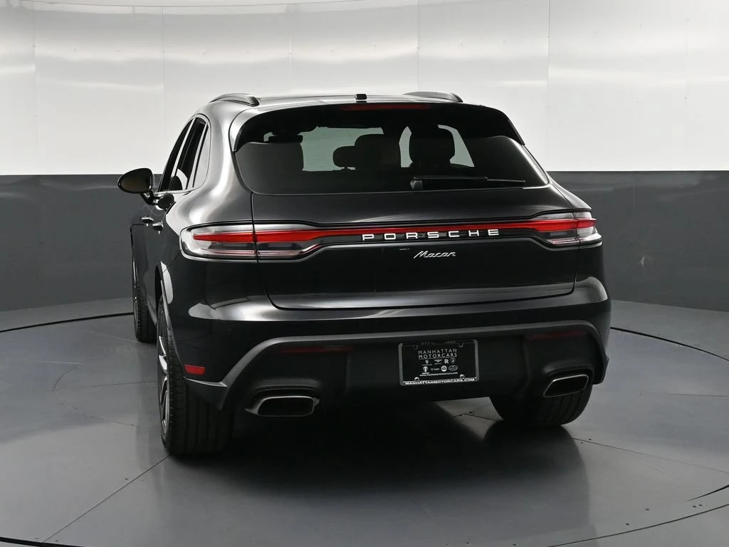 2026 Porsche Macan, rear three-quarter view, Black