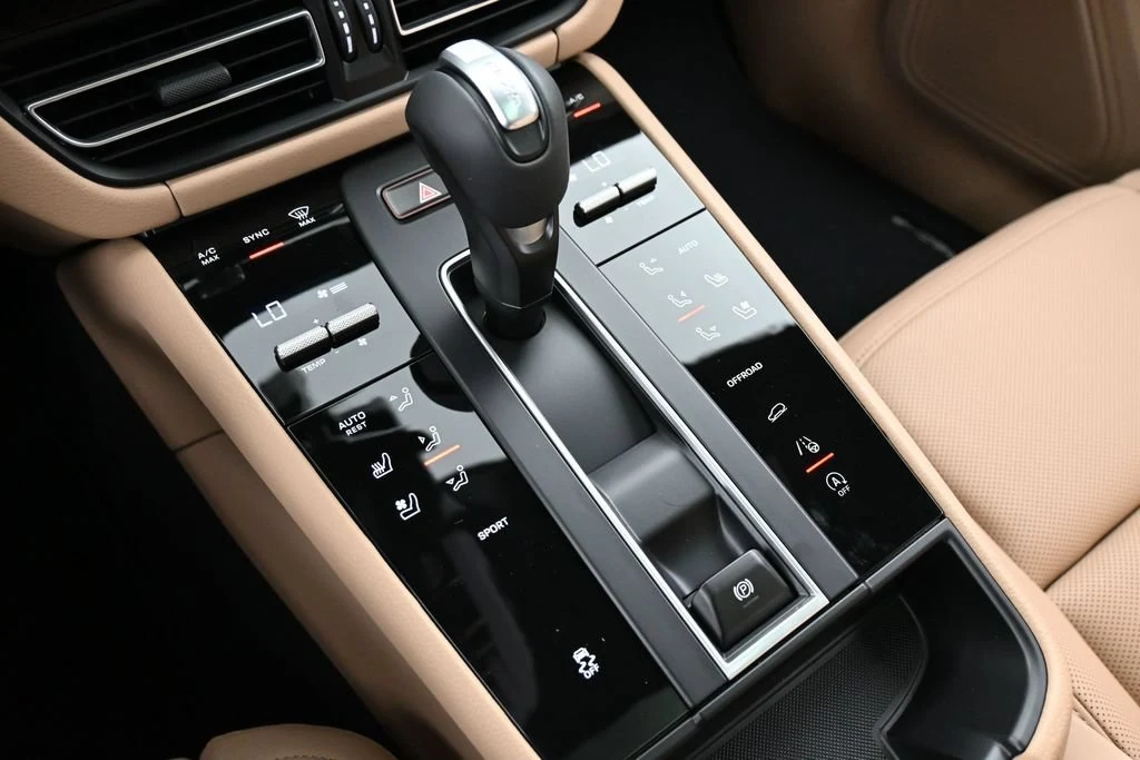 2026 Porsche Macan interior, center console, Black/Mojave Beige
