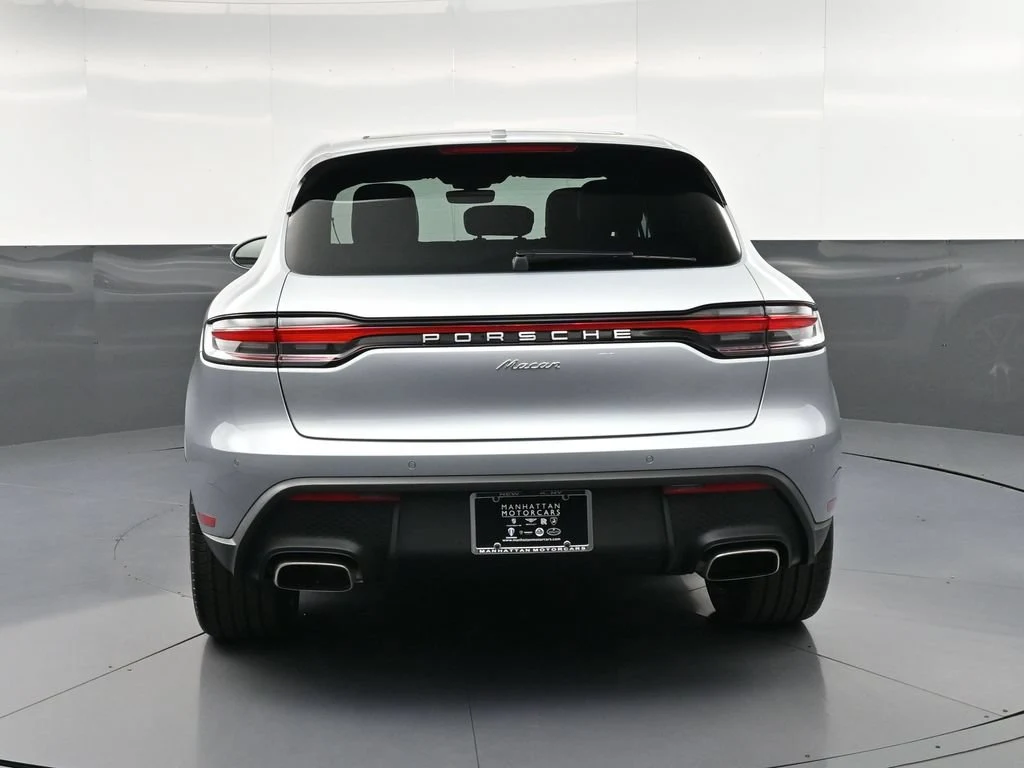2026 Porsche Macan, rear three-quarter view, Silver