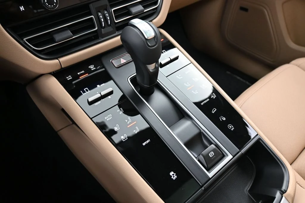 2026 Porsche Macan interior, center console, Black/Mojave Beige