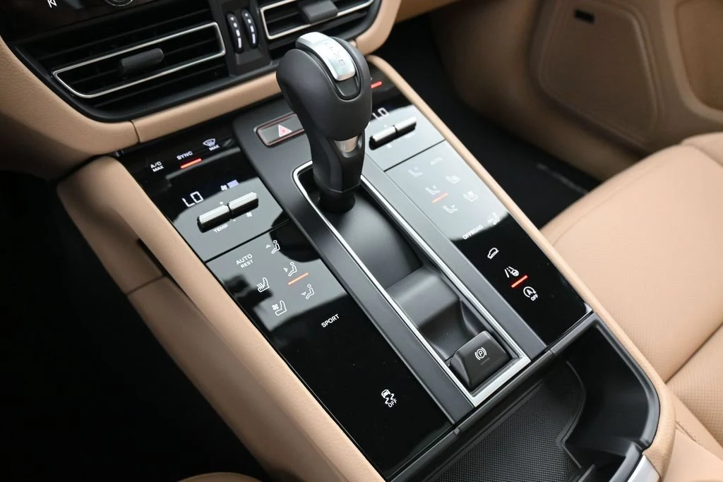 2026 Porsche Macan interior, center console, Black/Mojave Beige
