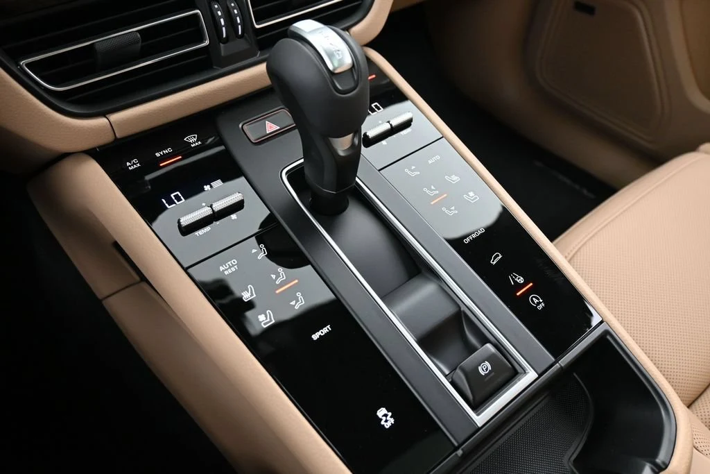 2026 Porsche Macan interior, center console, Black/Mojave Beige
