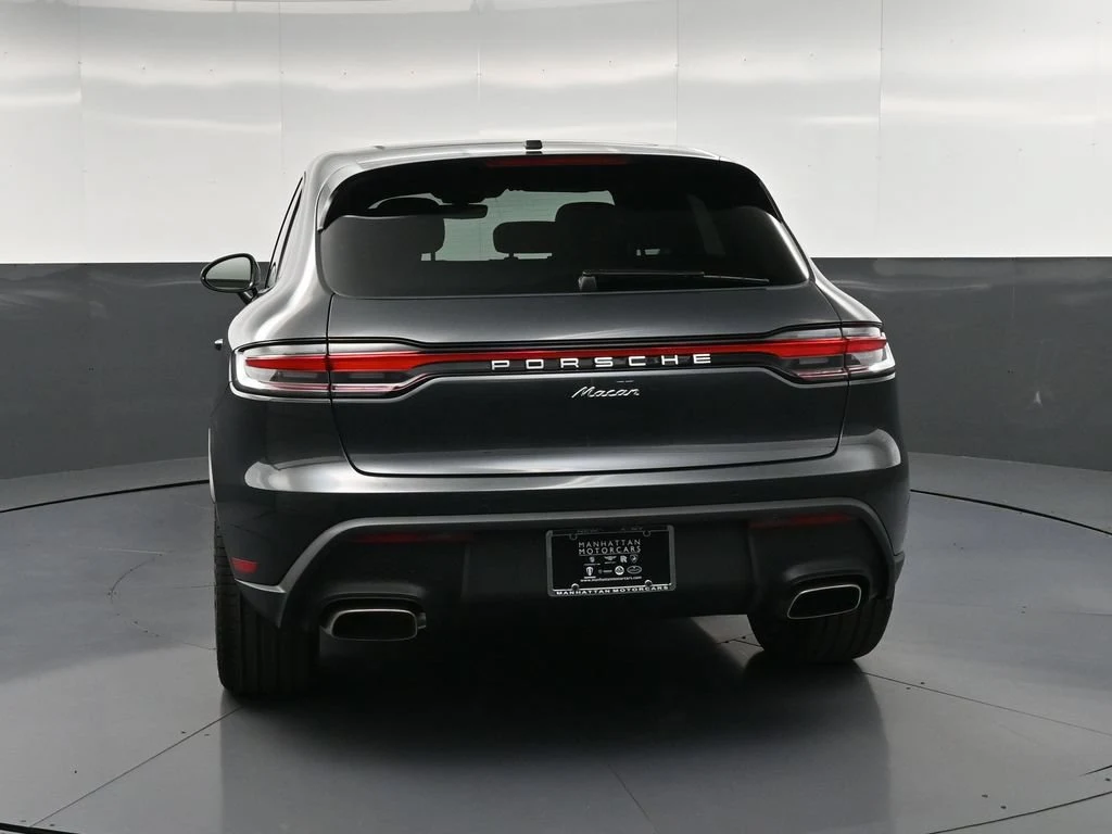 2026 Porsche Macan, rear three-quarter view, Grey