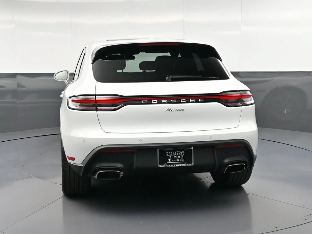 2026 Porsche Macan, rear three-quarter view, White