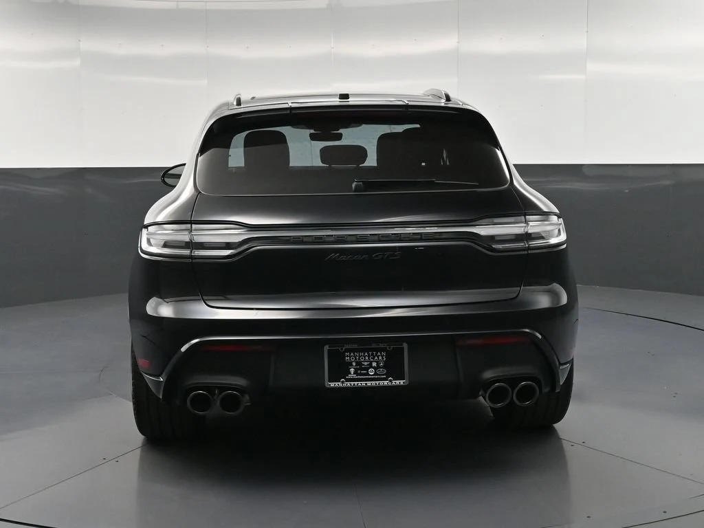 2026 Porsche Macan GTS, rear three-quarter view, Black