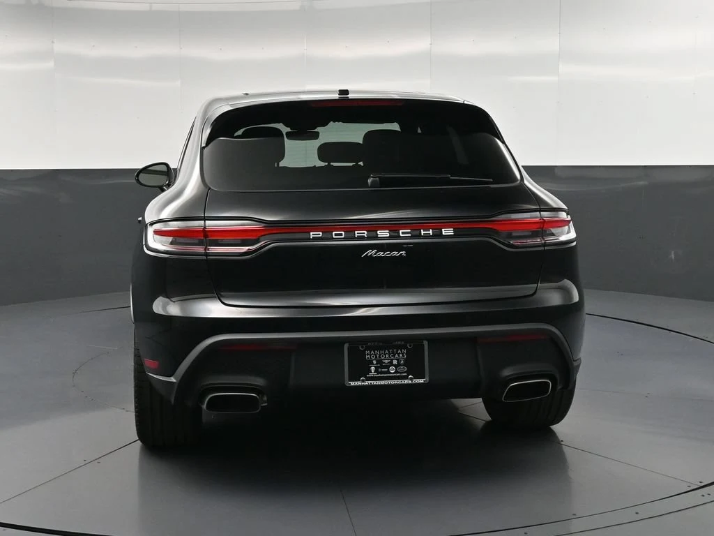 2026 Porsche Macan, rear three-quarter view, Black