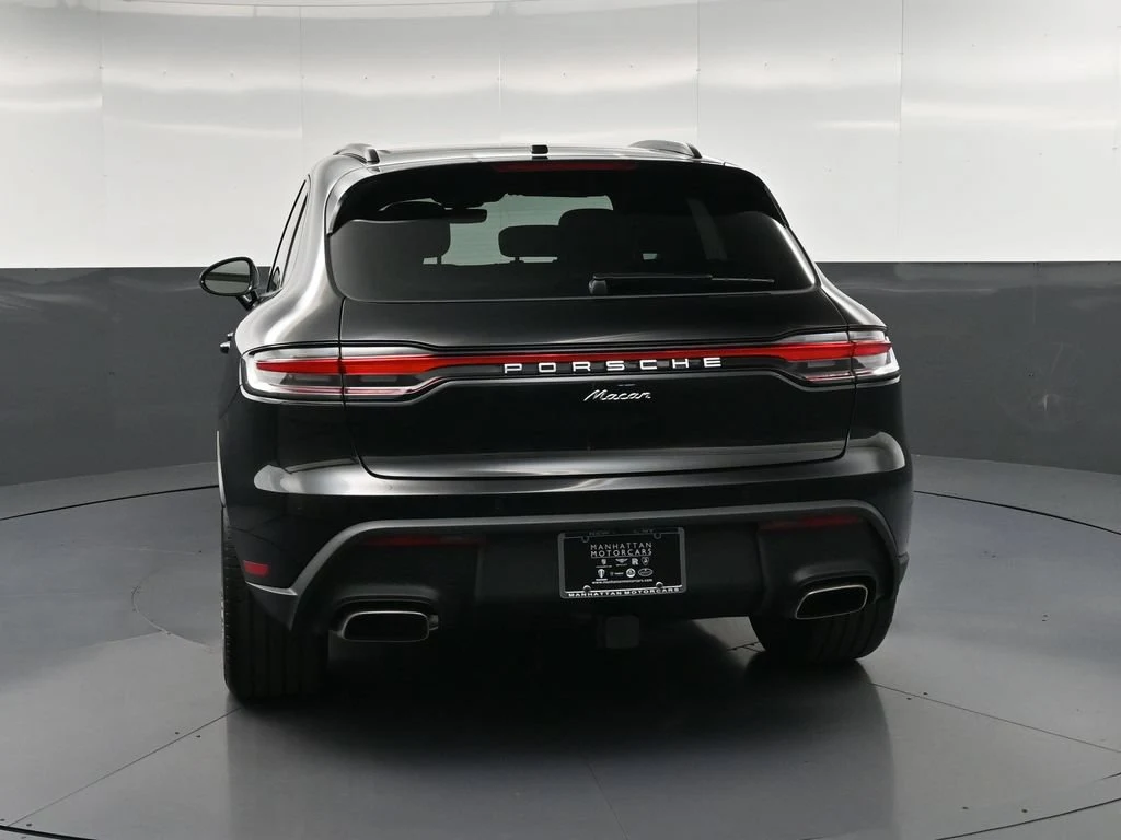 2026 Porsche Macan, rear three-quarter view, Black
