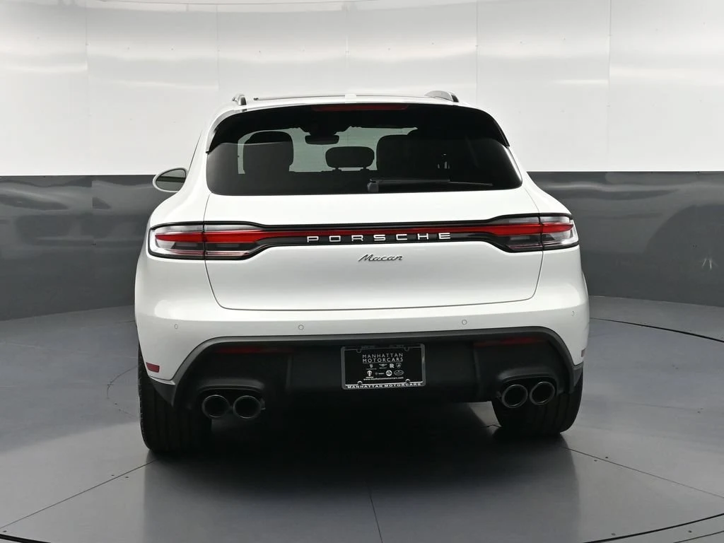 2026 Porsche Macan, rear three-quarter view, White