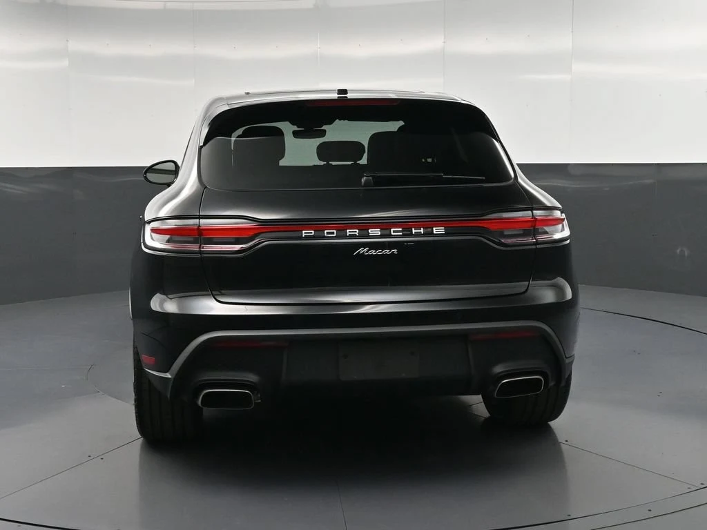 2026 Porsche Macan, rear three-quarter view, Black