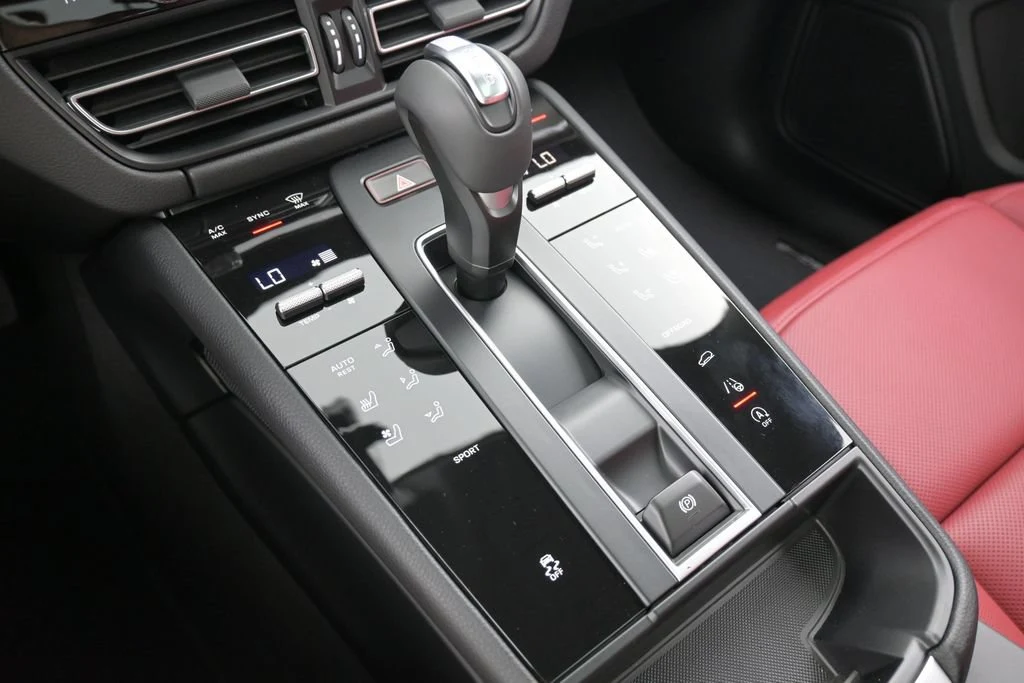 2026 Porsche Macan interior, center console, Black/Bordeaux Red