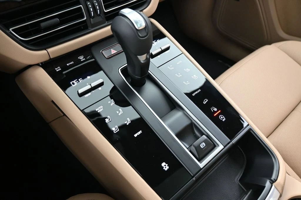 2026 Porsche Macan interior, center console, Black/Mojave Beige