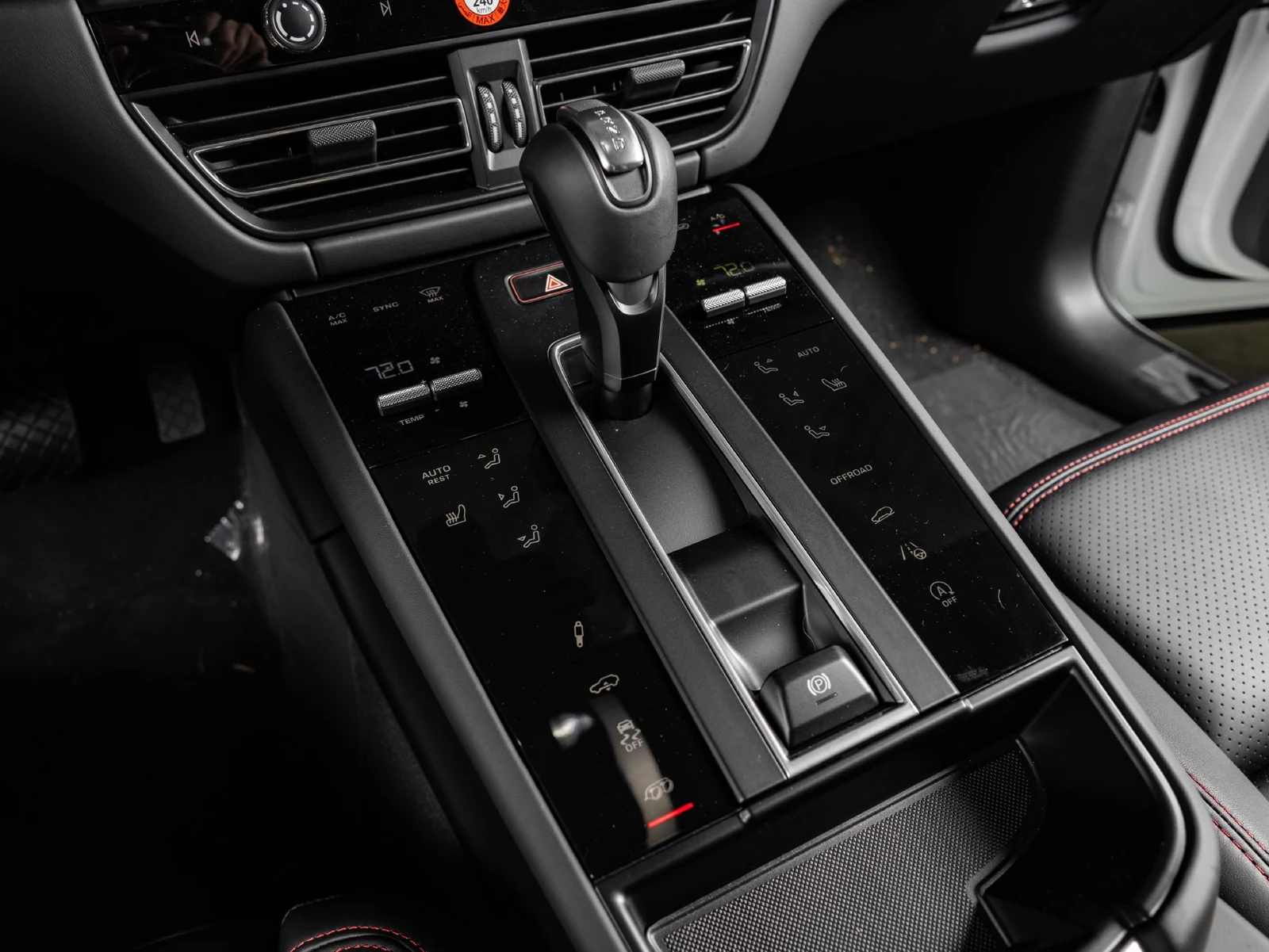 2026 Porsche Macan GTS interior, center console, Black / Carmine Red