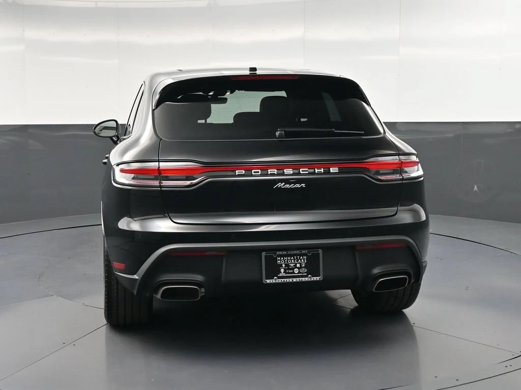 2026 Porsche Macan, rear three-quarter view, Black