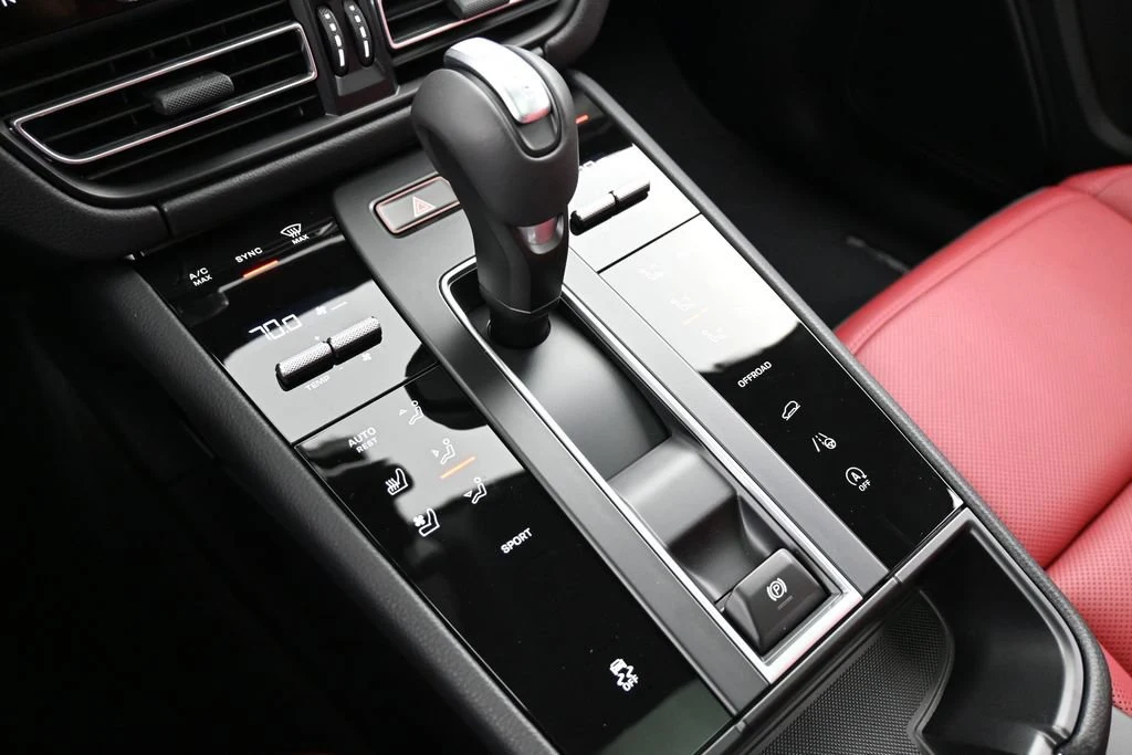 2026 Porsche Macan interior, center console, Black/Bordeaux Red