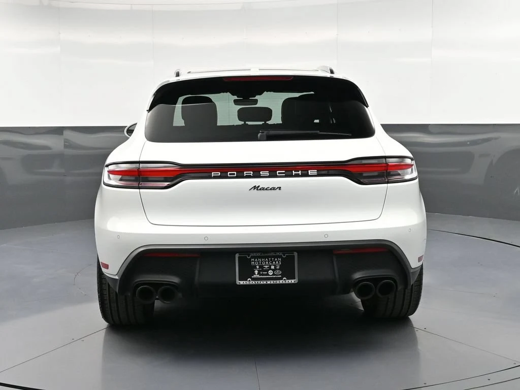 2026 Porsche Macan, rear three-quarter view, White