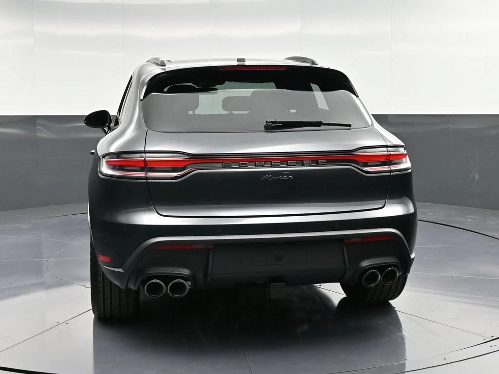 2026 Porsche Macan, rear three-quarter view, Grey