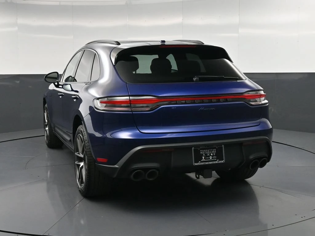 2026 Porsche Macan, rear three-quarter view, Blue