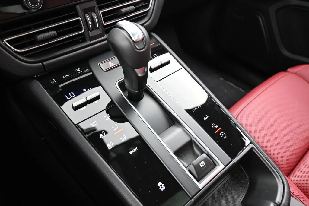 2026 Porsche Macan interior, center console, Black/Bordeaux Red