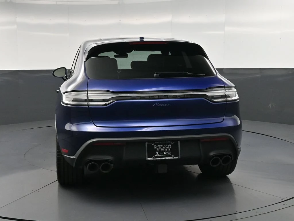 2026 Porsche Macan, rear three-quarter view, Blue