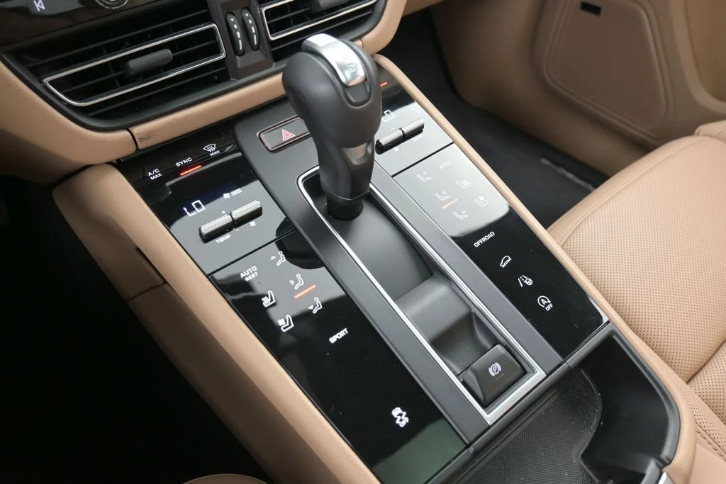 2026 Porsche Macan interior, center console, Black/Mojave Beige