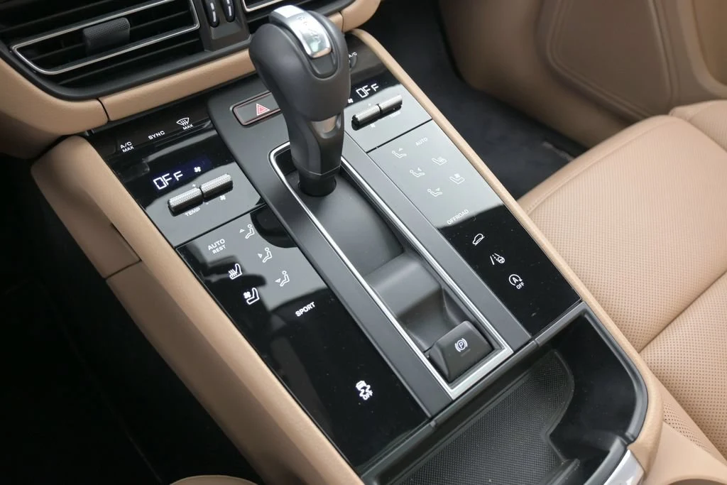 2026 Porsche Macan interior, center console, Black/Bordeaux Red