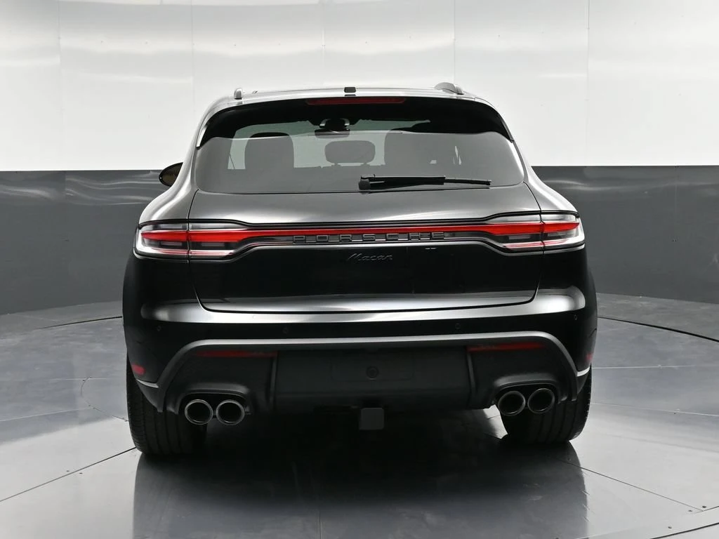 2026 Porsche Macan, rear three-quarter view, Black