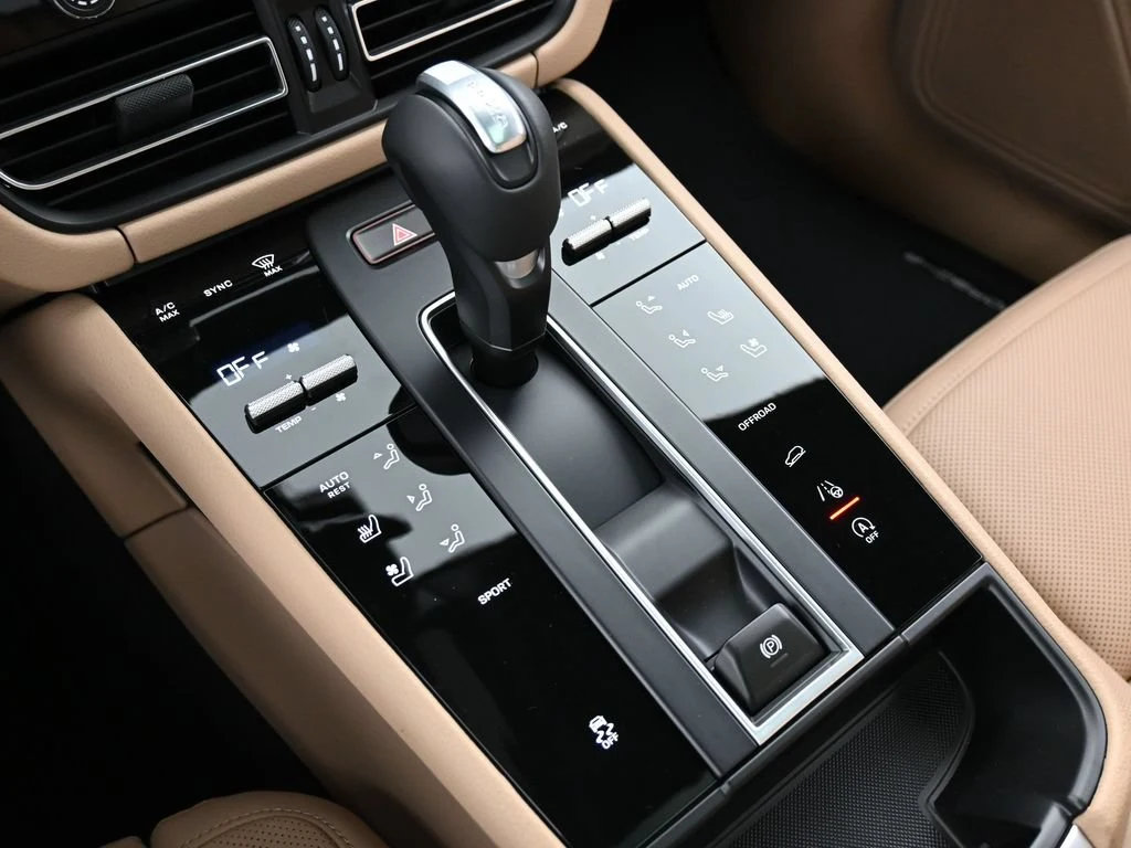 2026 Porsche Macan interior, center console, Black/Mojave Beige
