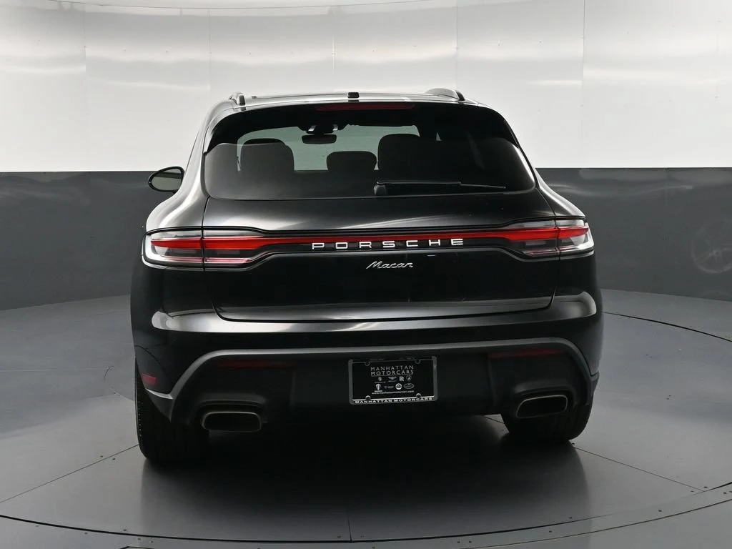 2026 Porsche Macan, rear three-quarter view, Black