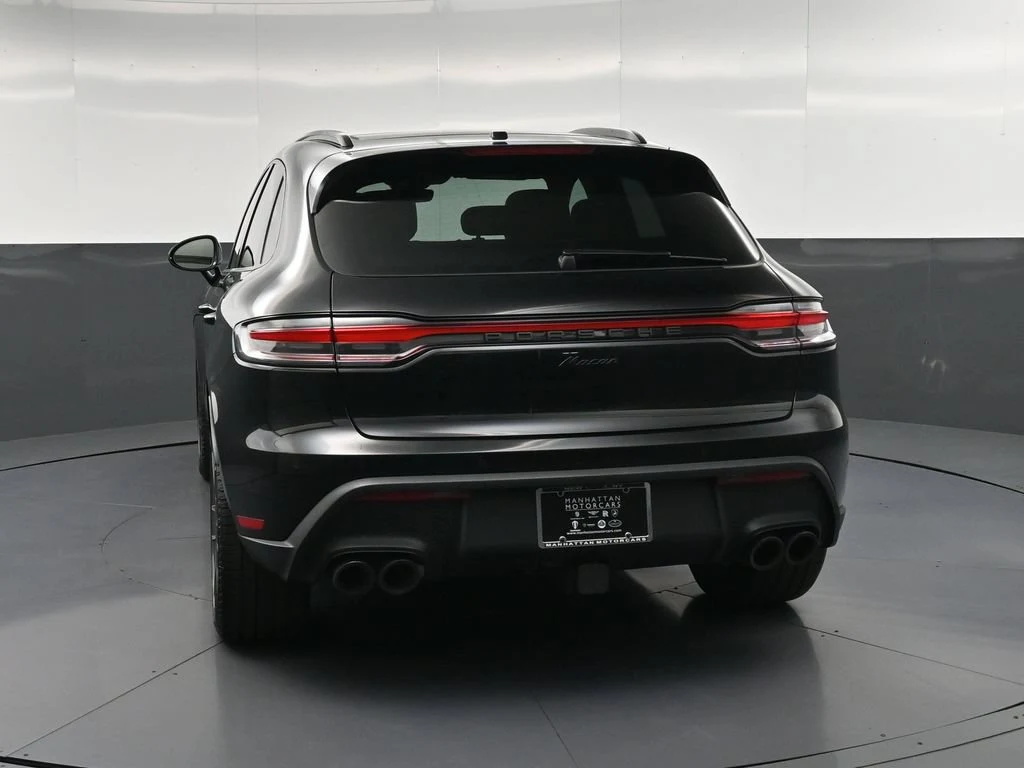 2026 Porsche Macan, rear three-quarter view, Black