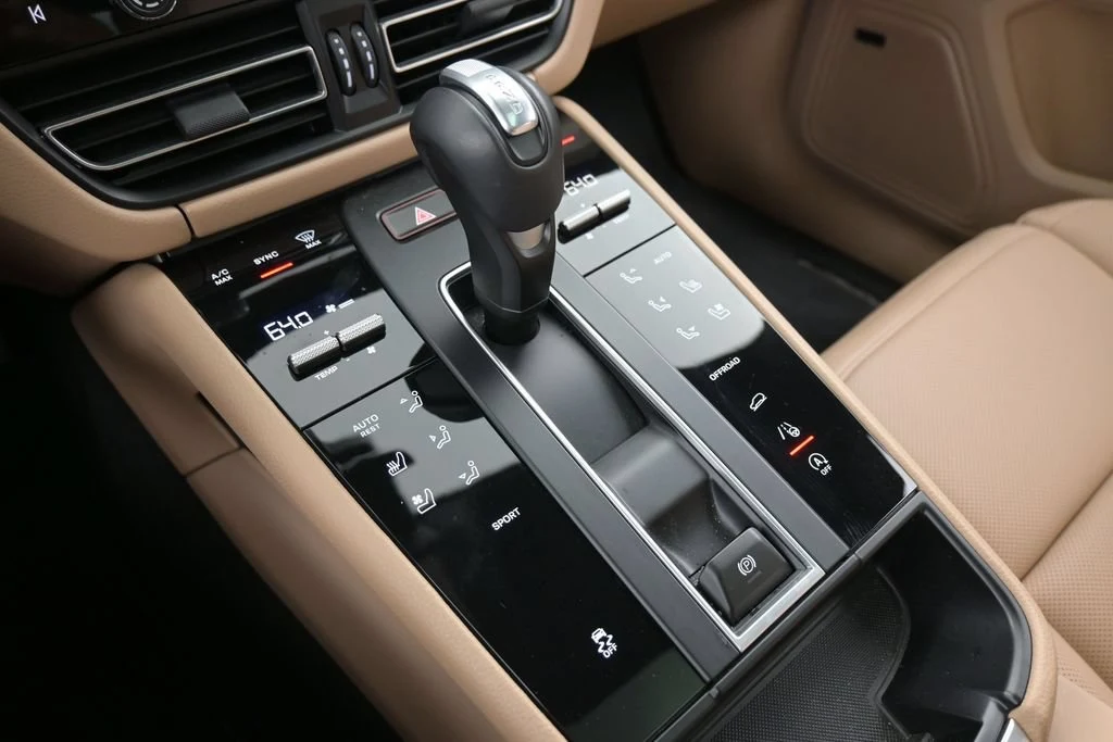 2026 Porsche Macan interior, center console, Black/Mojave Beige
