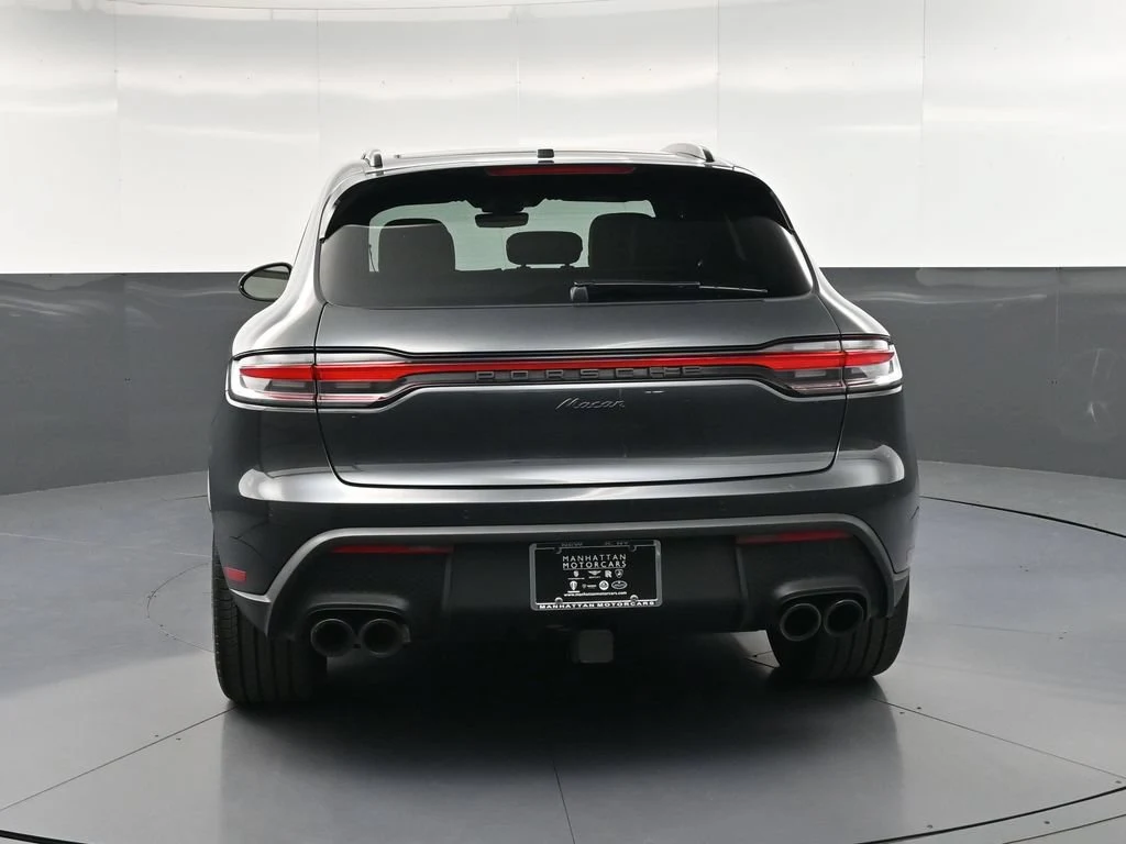 2026 Porsche Macan, rear three-quarter view, Grey