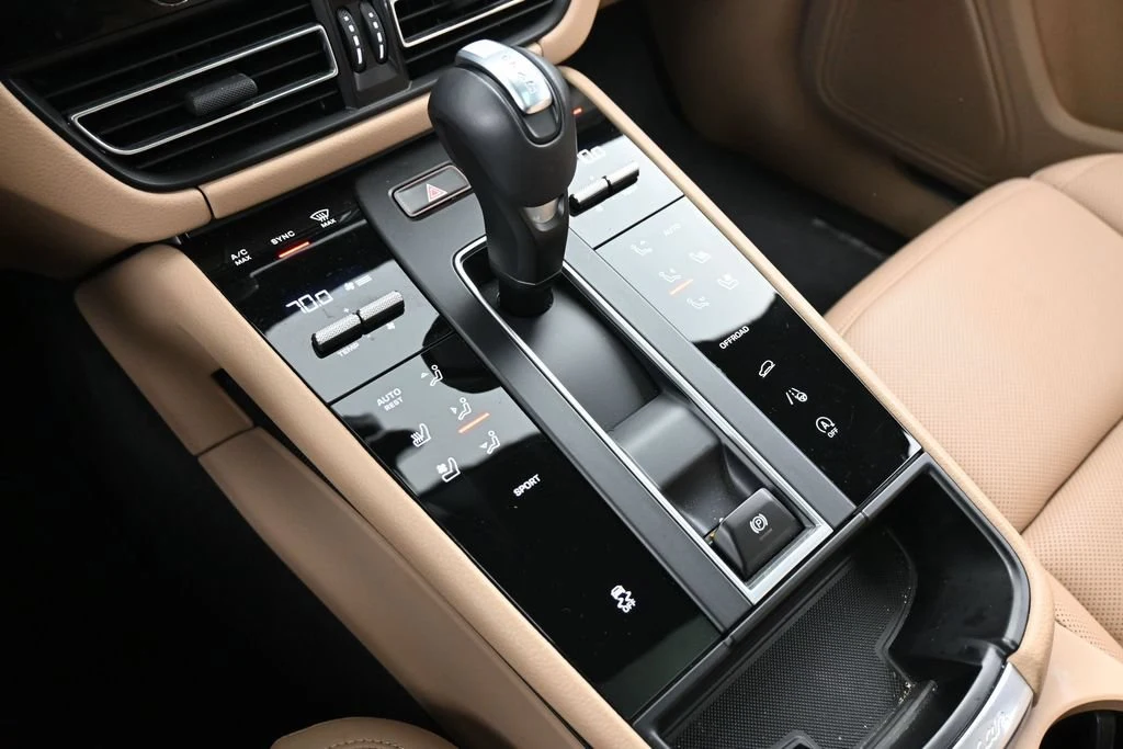 2026 Porsche Macan interior, center console, Black/Mojave Beige
