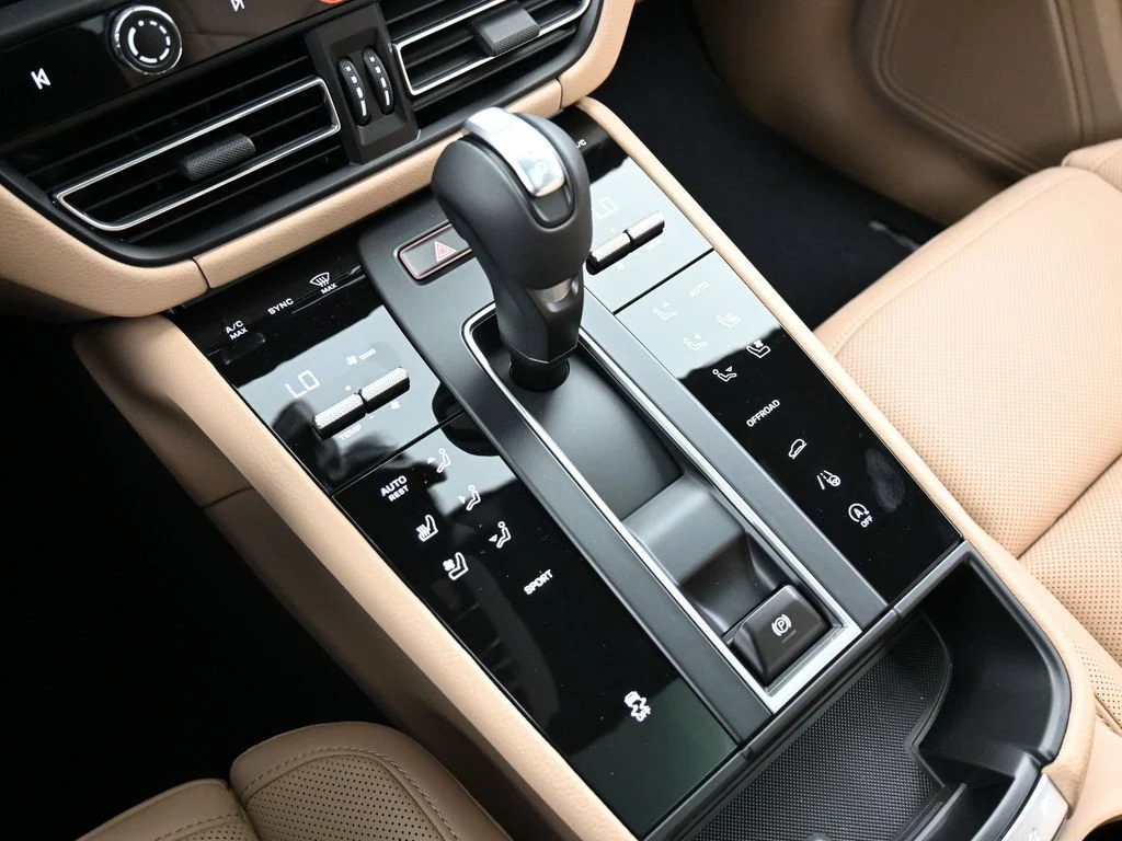 2026 Porsche Macan interior, center console, Black/Mojave Beige