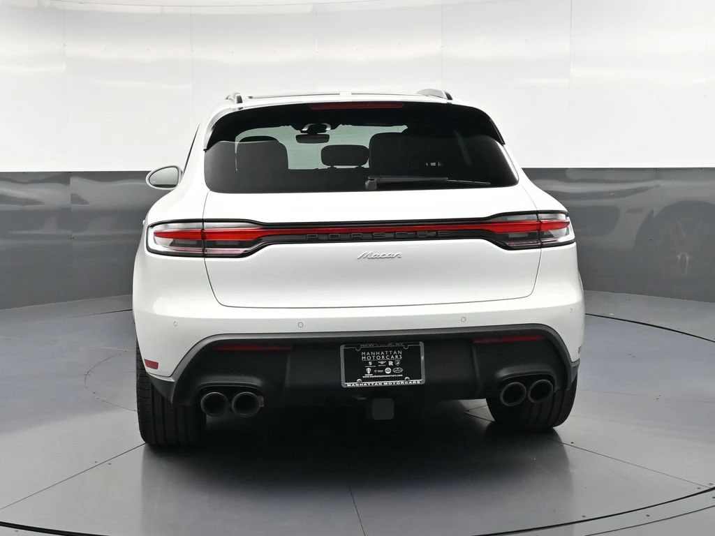 2026 Porsche Macan, rear three-quarter view, White