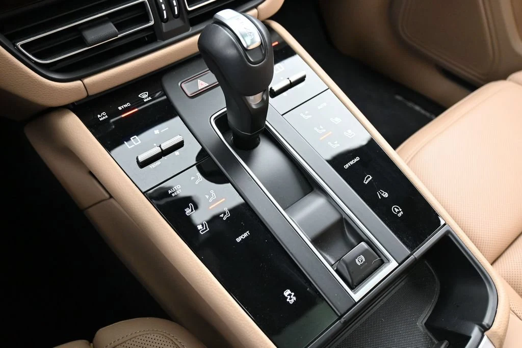 2026 Porsche Macan interior, center console, Black/Mojave Beige