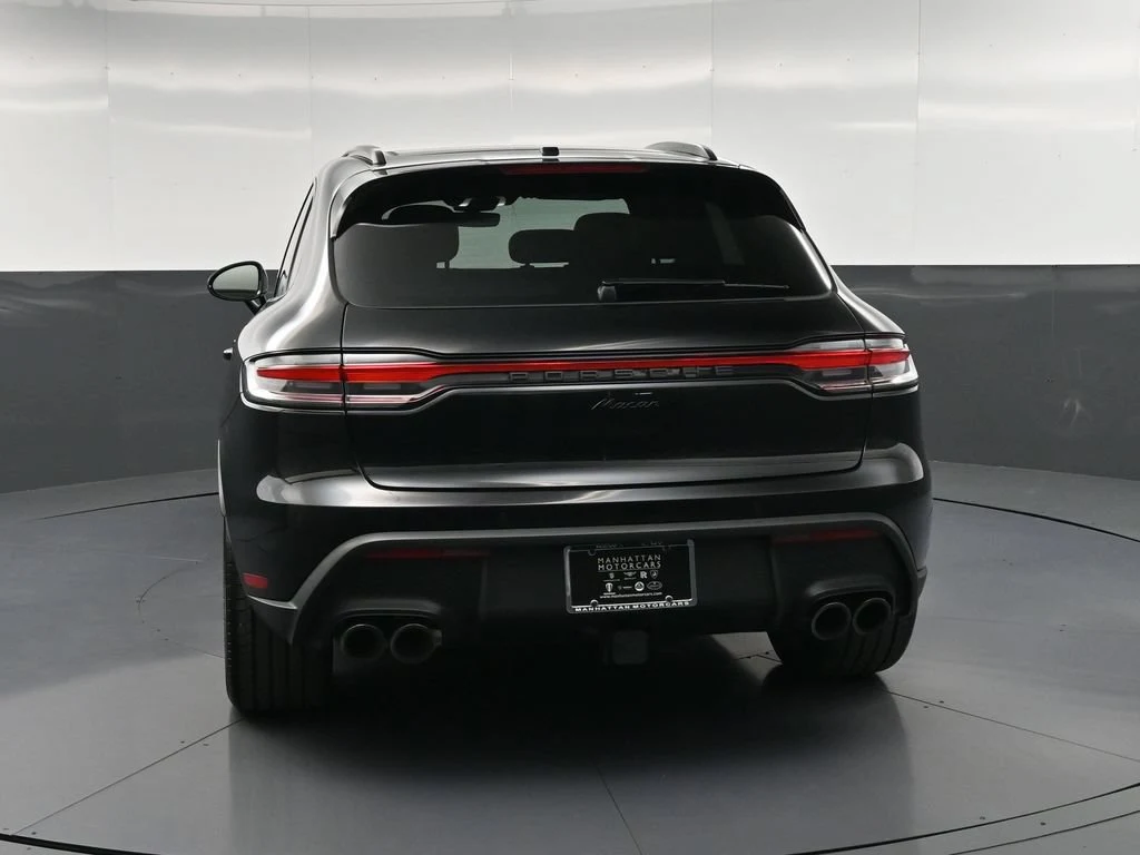 2026 Porsche Macan, rear three-quarter view, Black