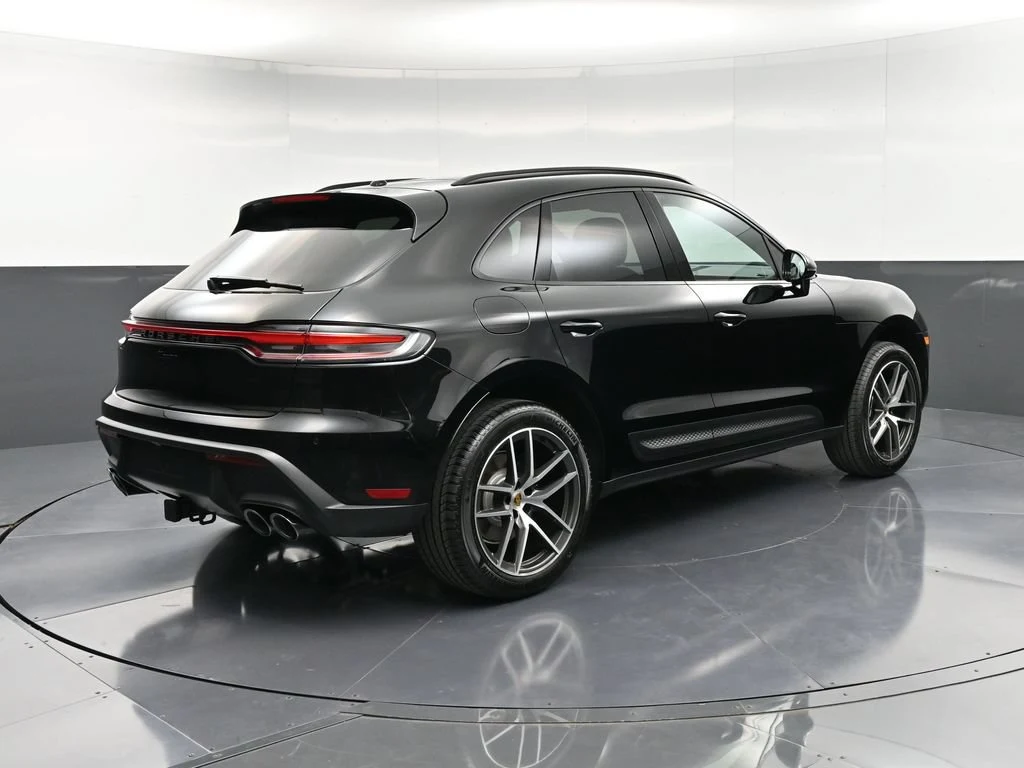 2026 Porsche Macan, rear three-quarter view, Black