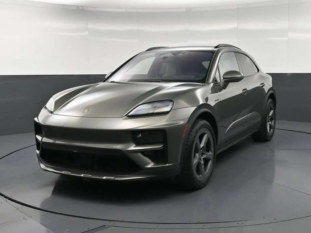 2025 Porsche Macan Turbo Electric for sale, front three-quarter view, Green