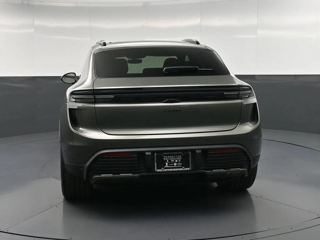 2025 Porsche Macan Turbo Electric, rear three-quarter view, Green