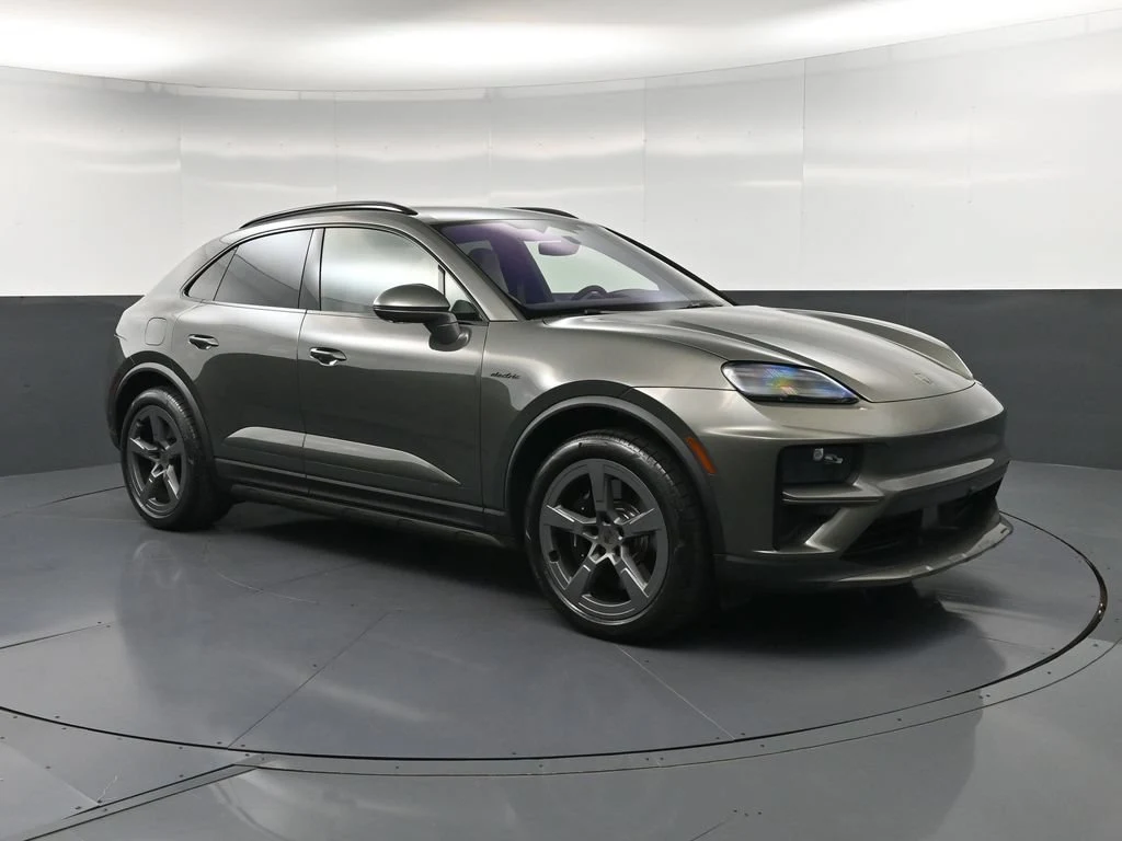 2025 Porsche Macan Turbo Electric for sale, front three-quarter view, Green