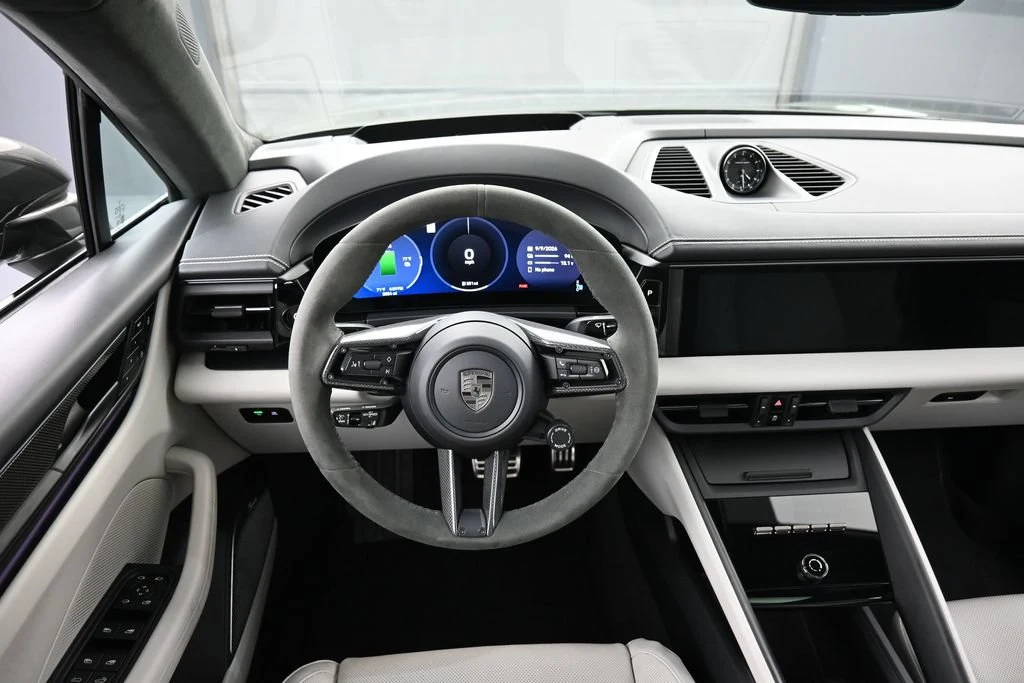 2025 Porsche Macan Turbo Electric interior, dashboard, Black/Chalk