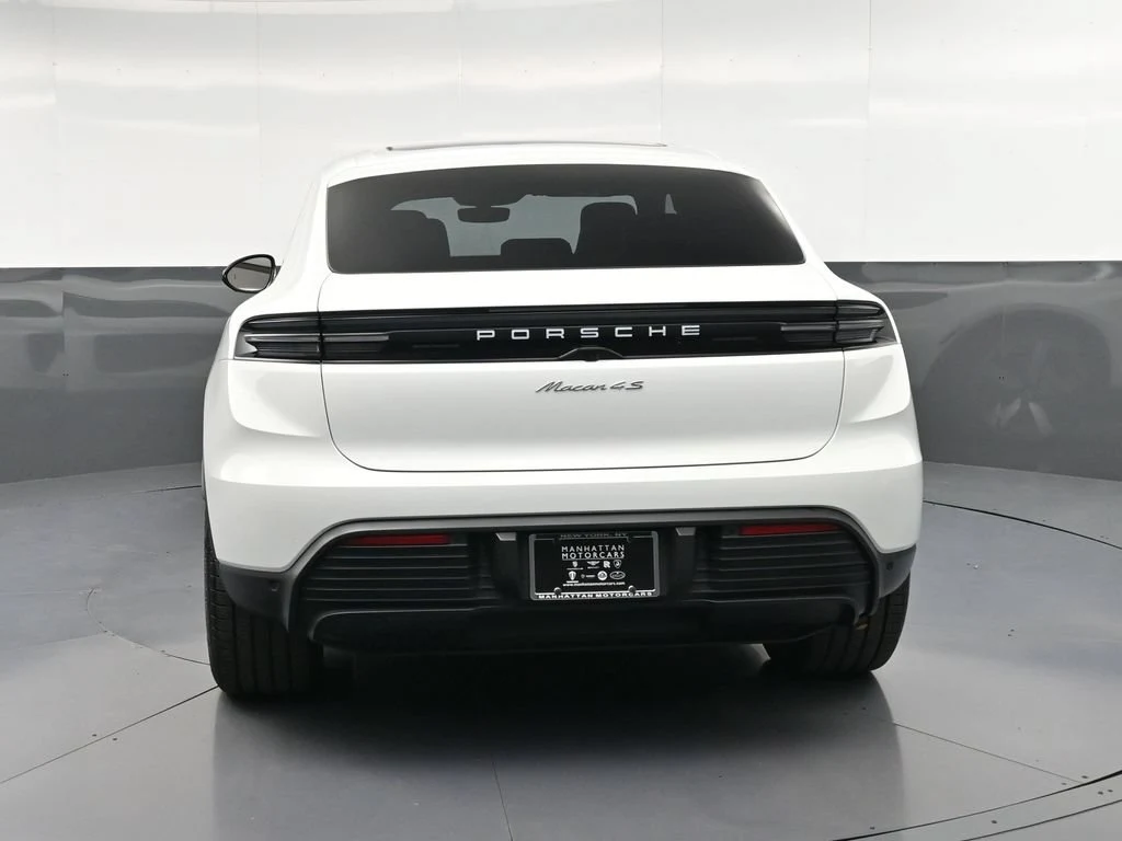2025 Porsche Macan 4S Electric, rear three-quarter view, White