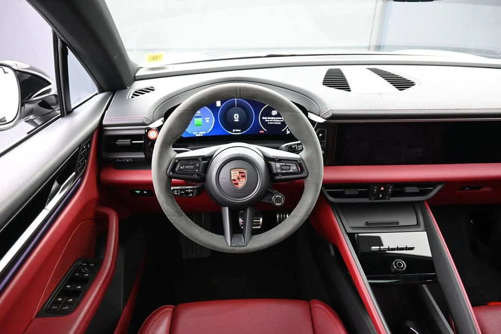 2025 Porsche Macan 4S Electric interior, dashboard, Black/Bordeaux Red