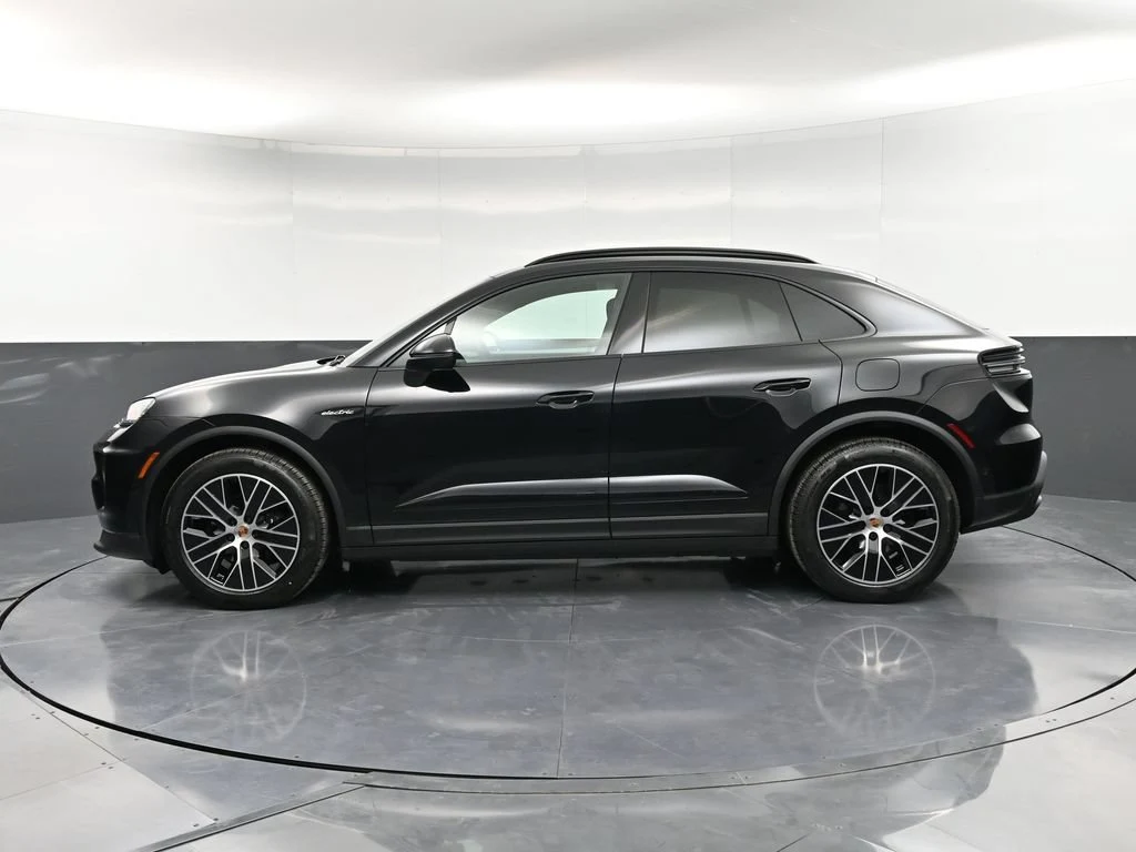 2026 Porsche Macan 4 Electric, side profile, Black