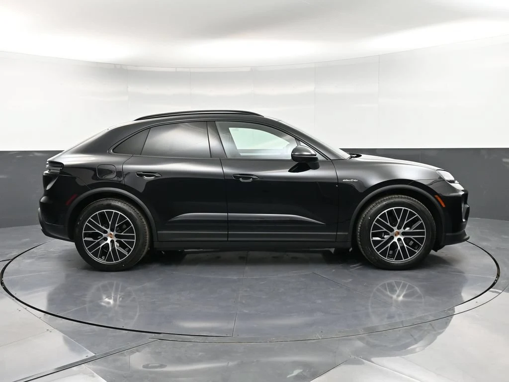 2026 Porsche Macan 4 Electric, side profile, Black
