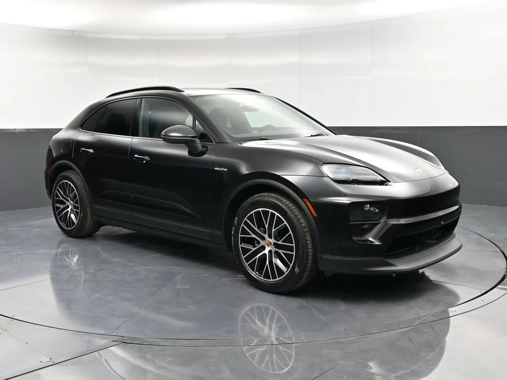 2026 Porsche Macan 4 Electric for sale, front three-quarter view, Black