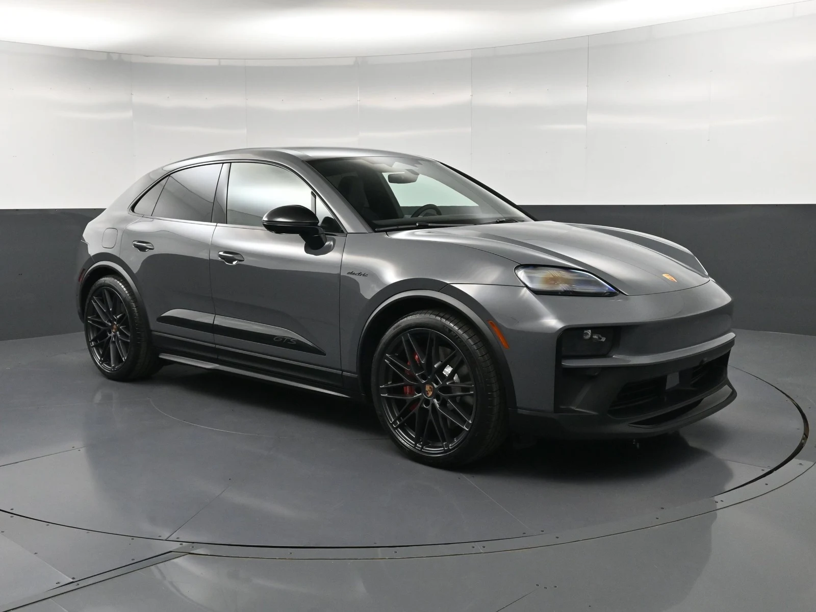 2026 Porsche Macan GTS Electric for sale, front three-quarter view, Grey