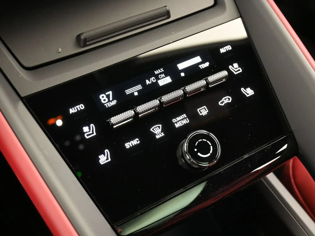 2026 Porsche Macan 4 Electric interior, center console, Black/Bordeaux Red