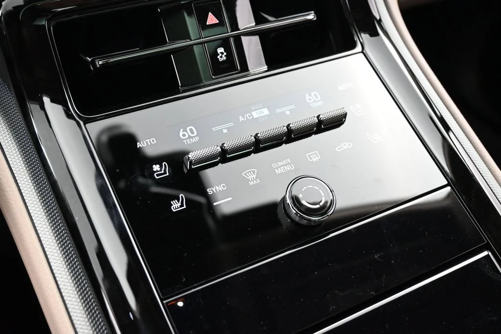 2026 Porsche Panamera 4 interior, center console, Black/Limestone Beige