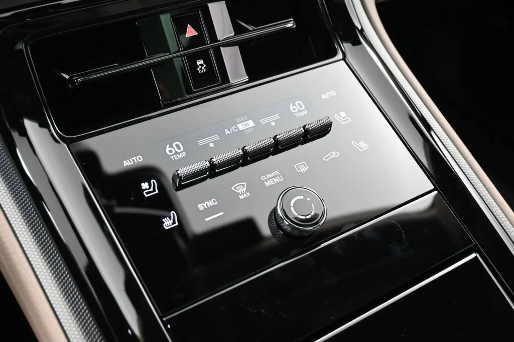2026 Porsche Panamera 4 interior, center console, Black/Limestone Beige